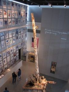A piece of the twin towers structure, as well as dozens of newspaper covers reporting the event.